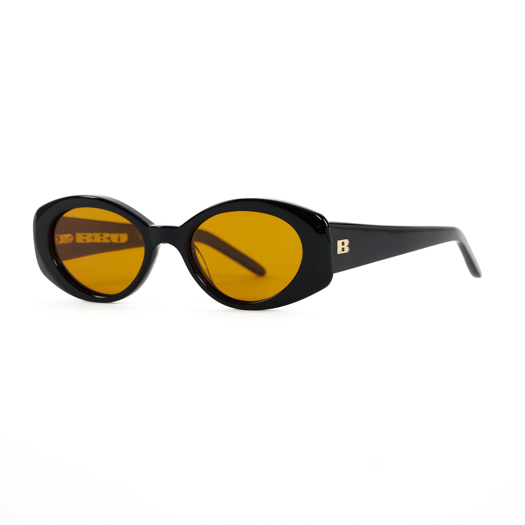 Thick framed oval sunglasses with an orange lens. Acetate Frames and Polarized lenses.